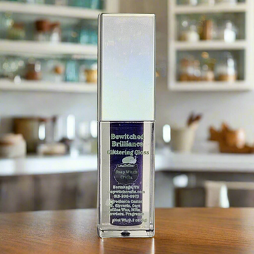 Bewitched Brilliance Glittering Gloss - Pucker Up Purple - 0