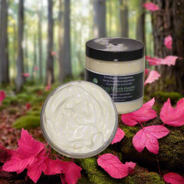 Two jars of cream with a forest background